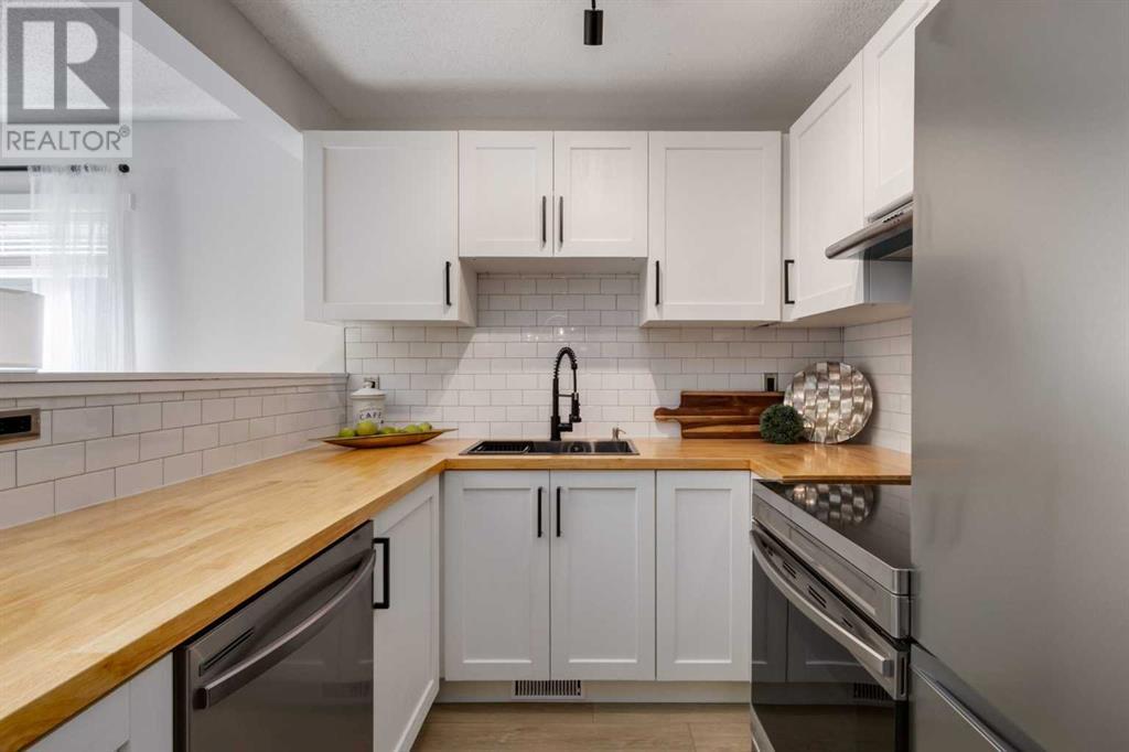 Single Family House for Sale in  Millrise Green SW Millrise Calgary 