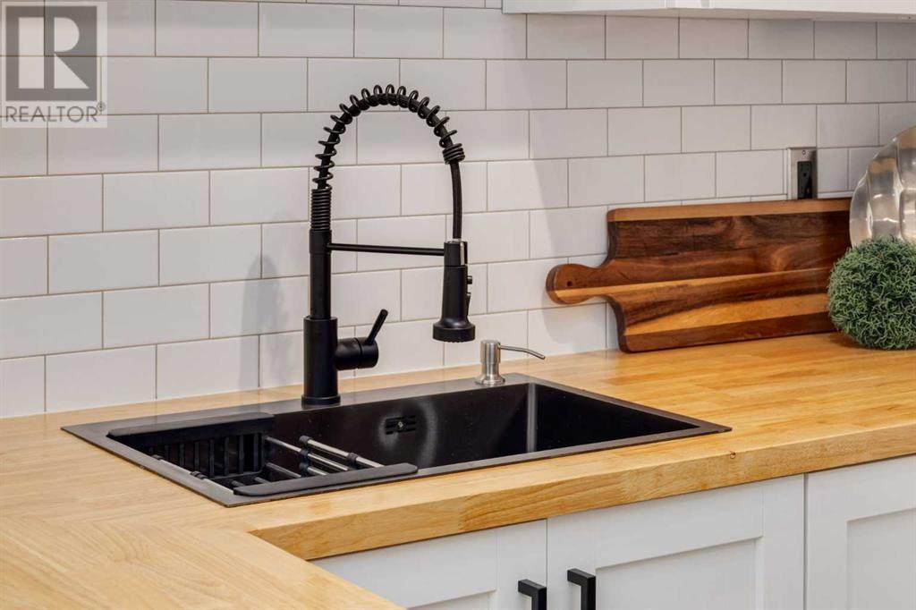 Single Family House for Sale in  Millrise Green SW Millrise Calgary 