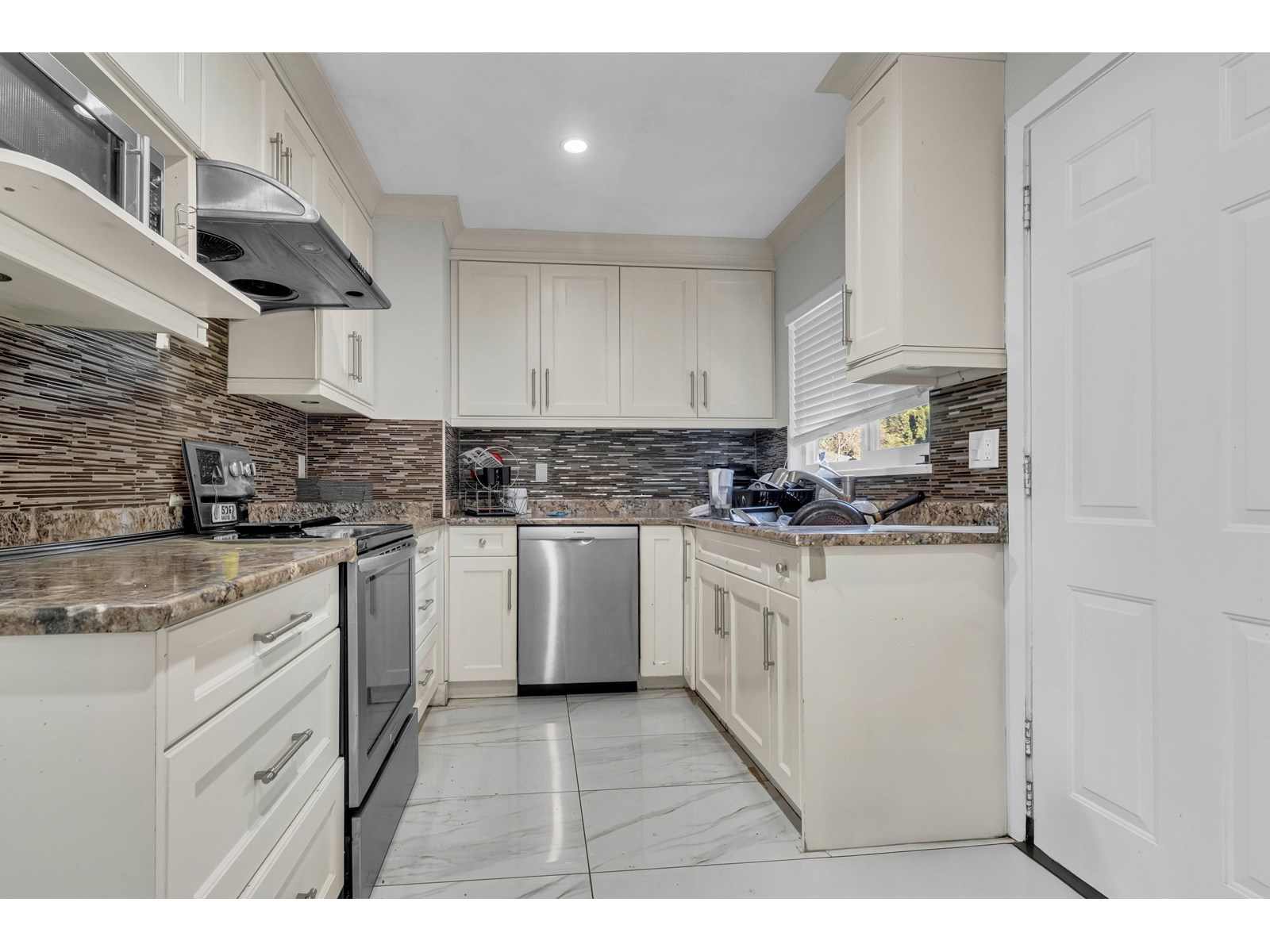 Photo 1 of 12552 99 Avenue, Surrey BC