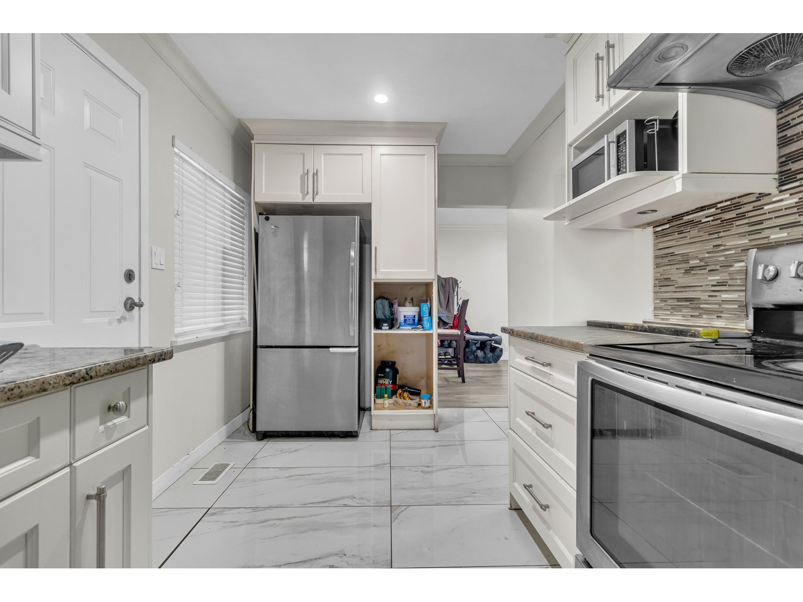 Photo 3 of 12552 99 Avenue, Surrey BC