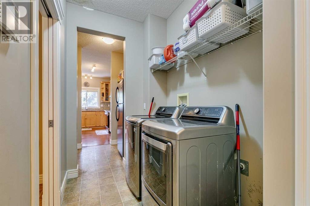 Single Family House for Sale in   Strathlea Common SW Strathcona Park Calgary 