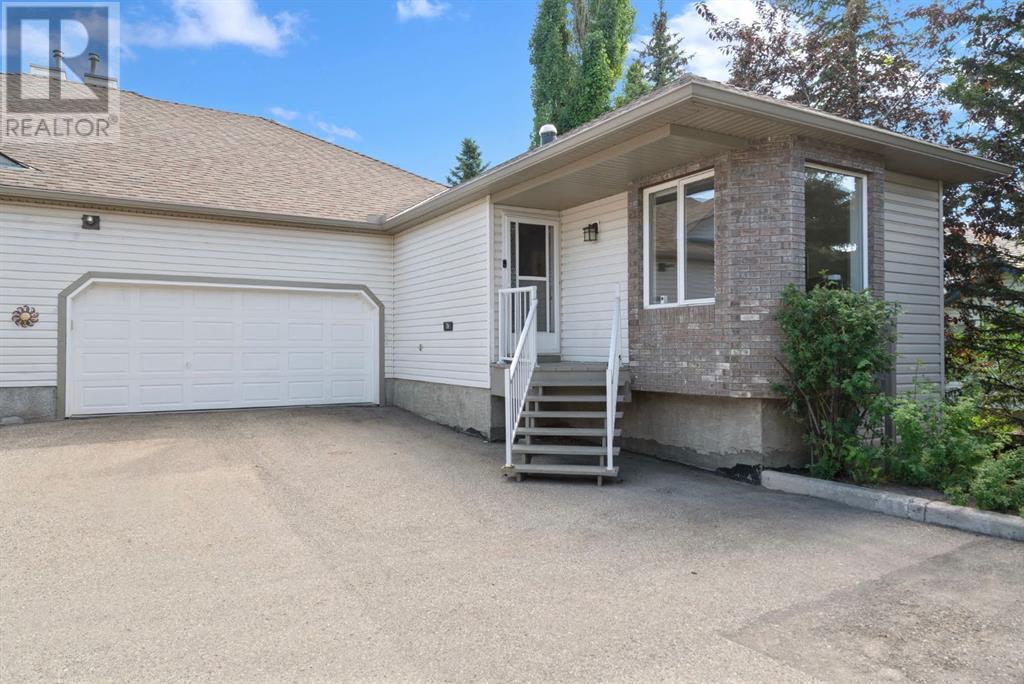 Single Family House Bungalow for Sale in  Mt Douglas Villas SE McKenzie Lake Calgary 
