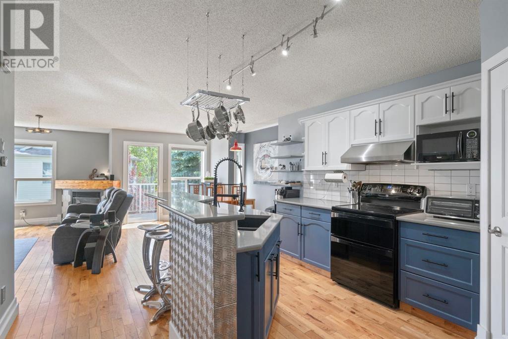 Single Family House Bungalow for Sale in  Mt Douglas Villas SE McKenzie Lake Calgary 