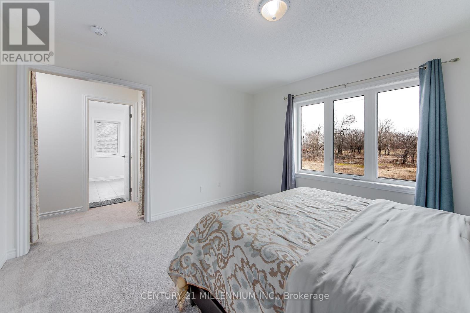 Photo 4 of 79 Rugman Crescent, Springwater ON