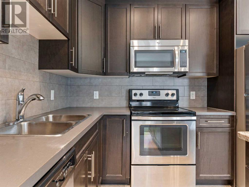 Single Family House Bungalow for Sale in  Auburn Bay Square SE Auburn Bay Calgary 