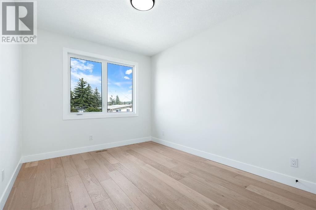 Single Family House for Sale in   Street SW Rosscarrock Calgary 