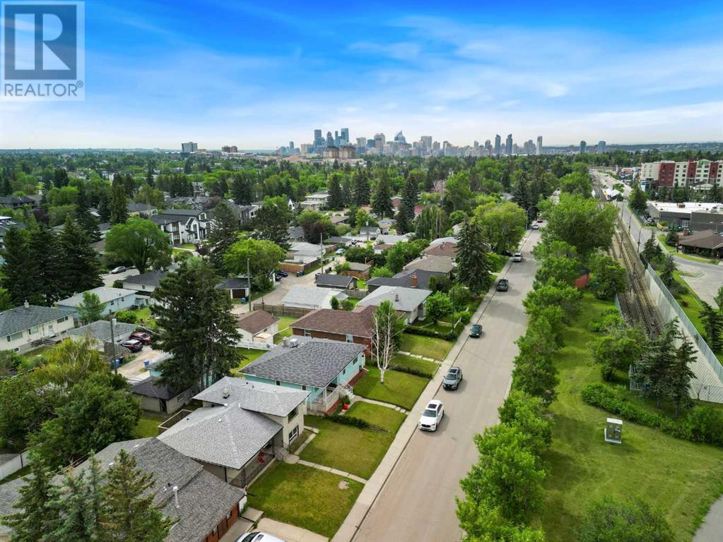 Single Family House 4 Level for Sale in  Capitol Hill Crescent NW Banff Trail Calgary 
