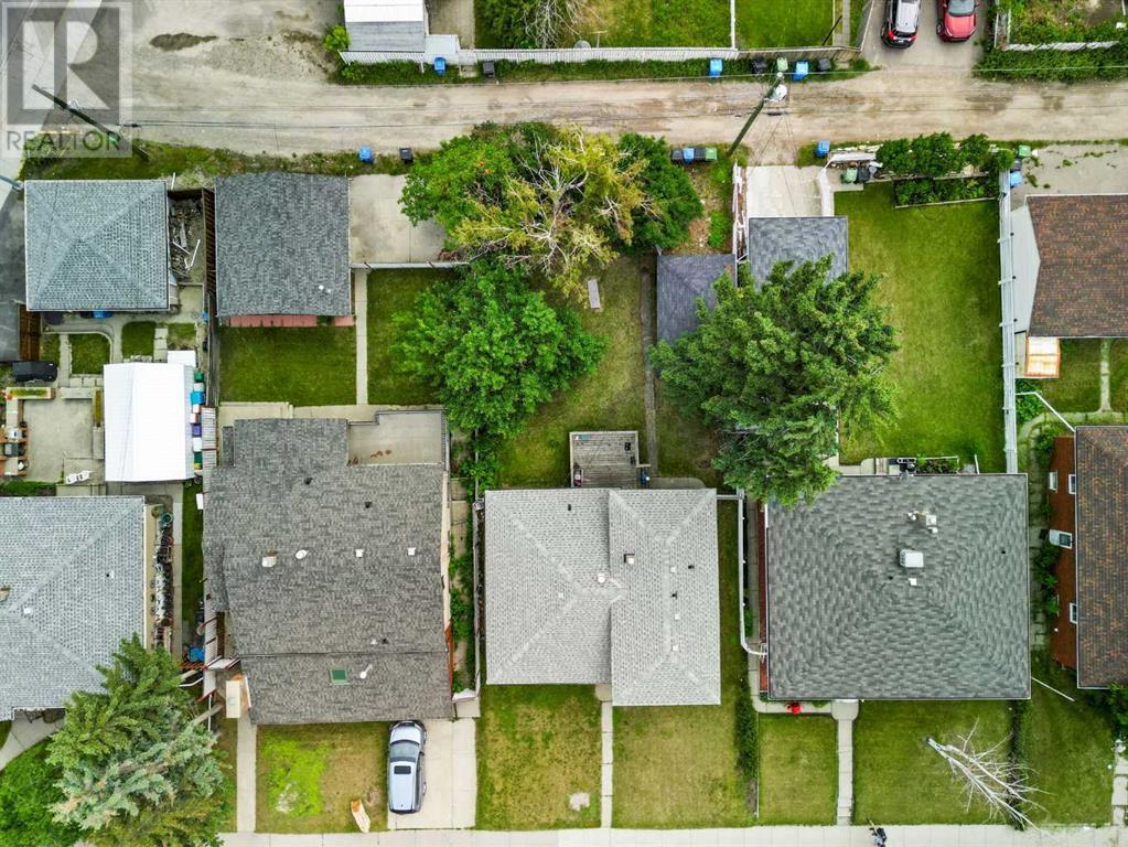 Single Family House 4 Level for Sale in  Capitol Hill Crescent NW Banff Trail Calgary 