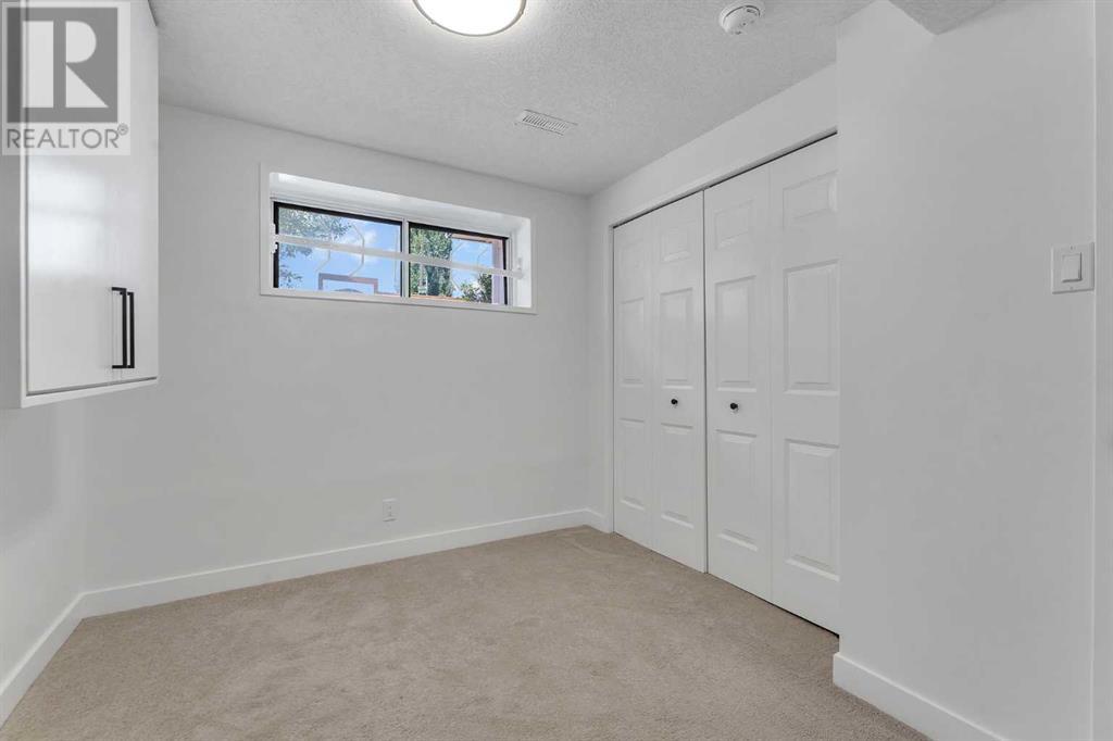 Single Family House Bi-level for Sale in  Cedardale Road SW Cedarbrae Calgary 