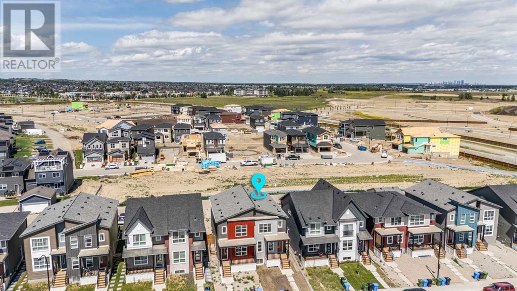 Single Family House for Sale in  Belmont Drive SW Belmont Calgary 