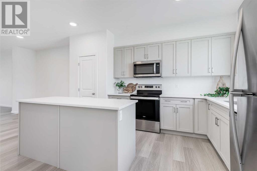 Single Family House for Sale in  Belmont Drive SW Belmont Calgary 