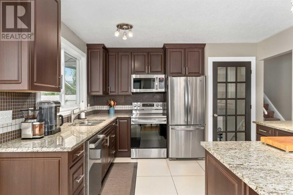 Single Family House 3 Level for Sale in  Huntbourne Hill NE Huntington Hills Calgary 
