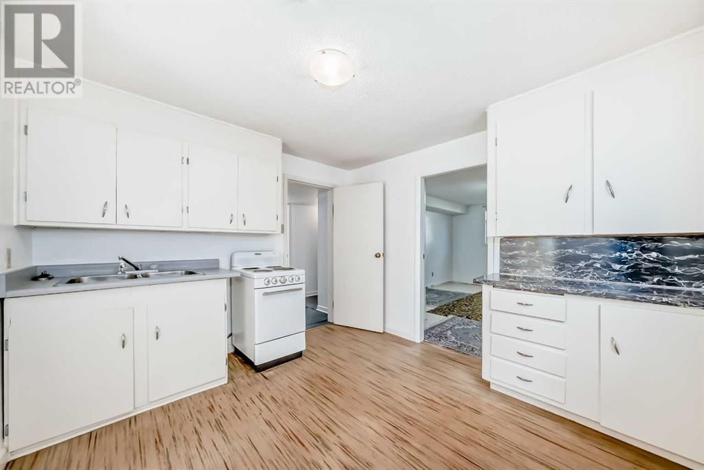 Single Family House Bungalow for Sale in  Child Avenue NE Renfrew Calgary 