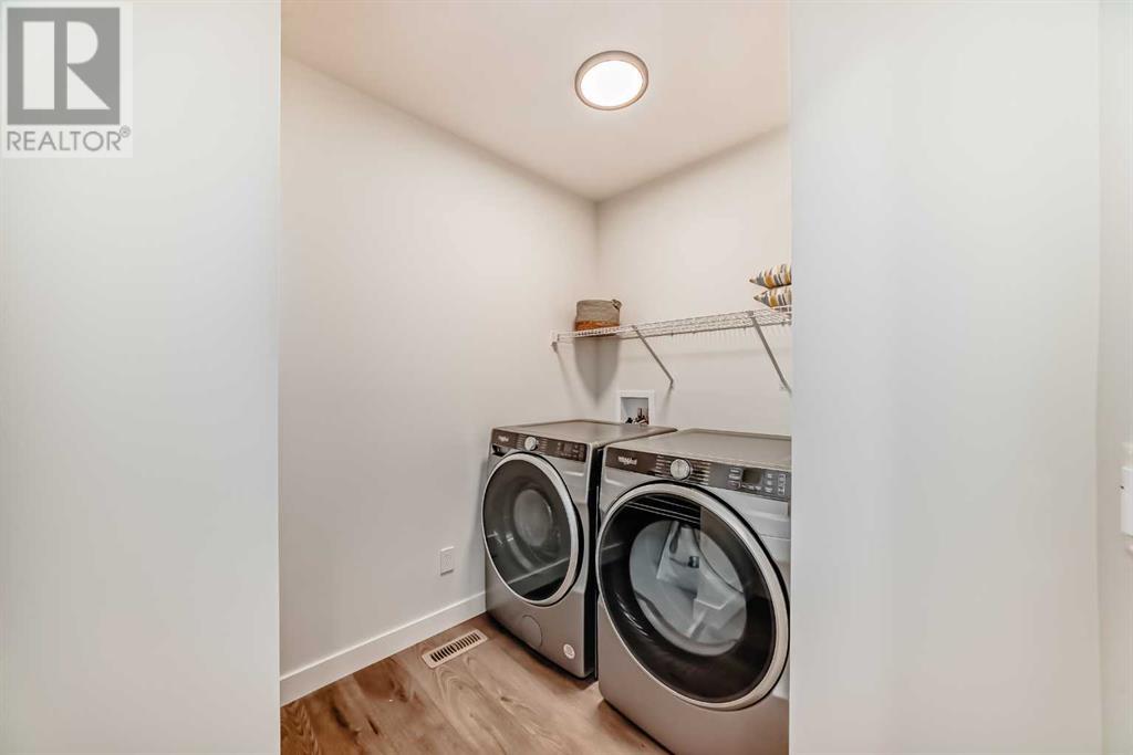 Single Family House for Sale in  Ambleside Crescent NW Moraine Calgary 