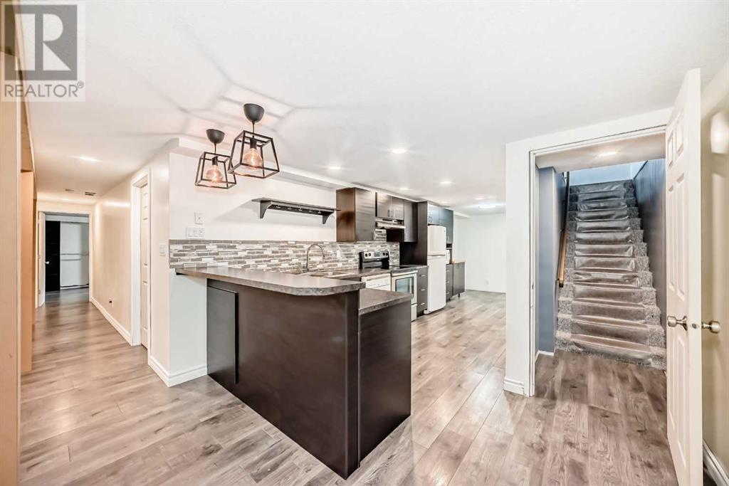 Single Family House Bungalow for Sale in  Kirby Place SW Kingsland Calgary 