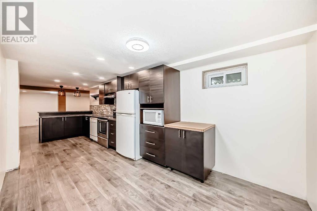 Single Family House Bungalow for Sale in  Kirby Place SW Kingsland Calgary 