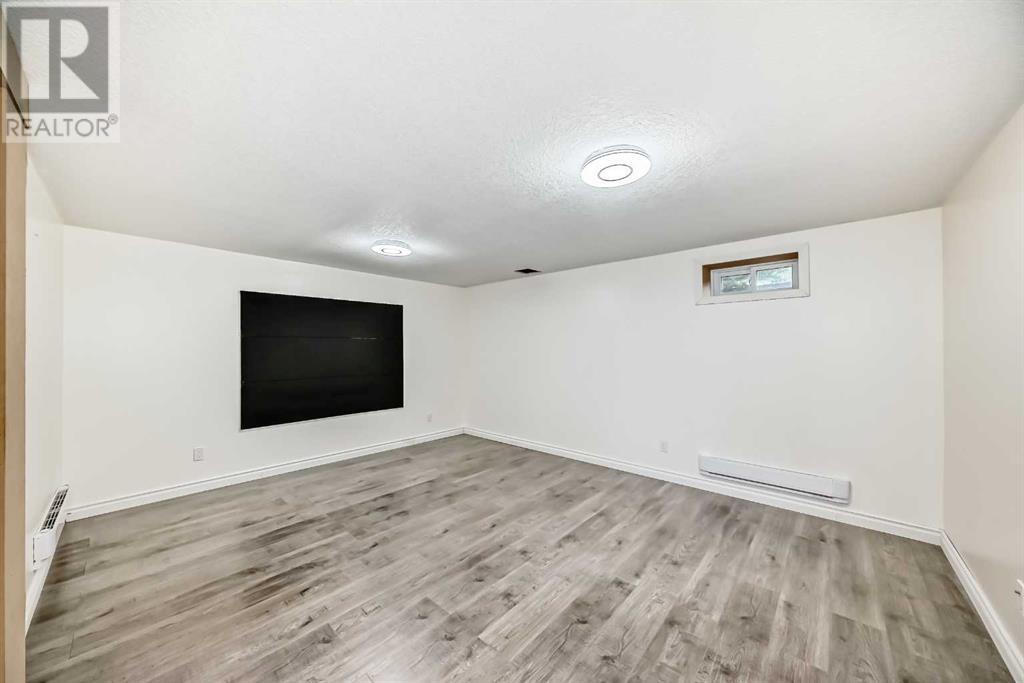Single Family House Bungalow for Sale in  Kirby Place SW Kingsland Calgary 