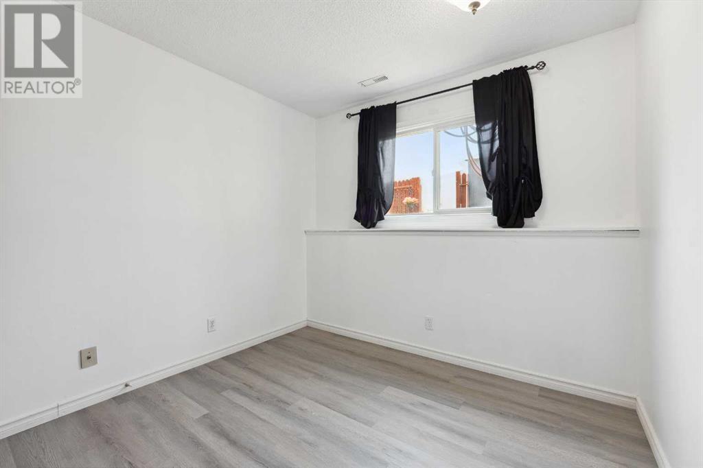 Single Family House Bi-level for Sale in E   Street SE Forest Lawn Calgary 