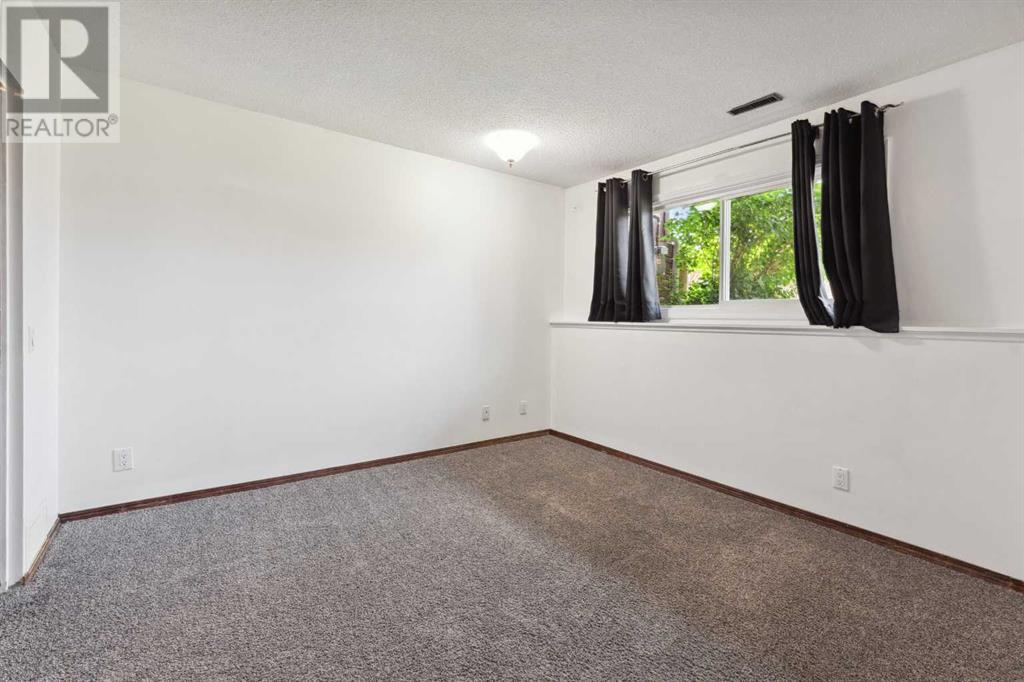 Single Family House Bi-level for Sale in E   Street SE Forest Lawn Calgary 