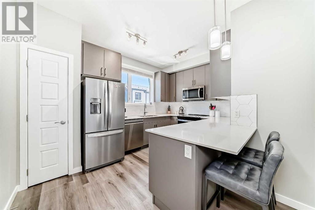 Single Family House for Sale in   Belmont Drive SW Belmont Calgary 