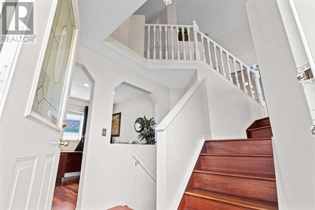 Single Family House 4 Level for Sale in  Arbour Ridge Park NW Arbour Lake Calgary 