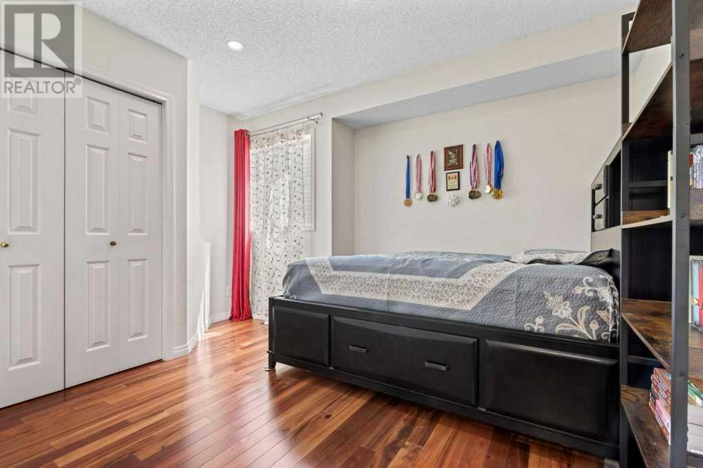 Single Family House 4 Level for Sale in  Arbour Ridge Park NW Arbour Lake Calgary 