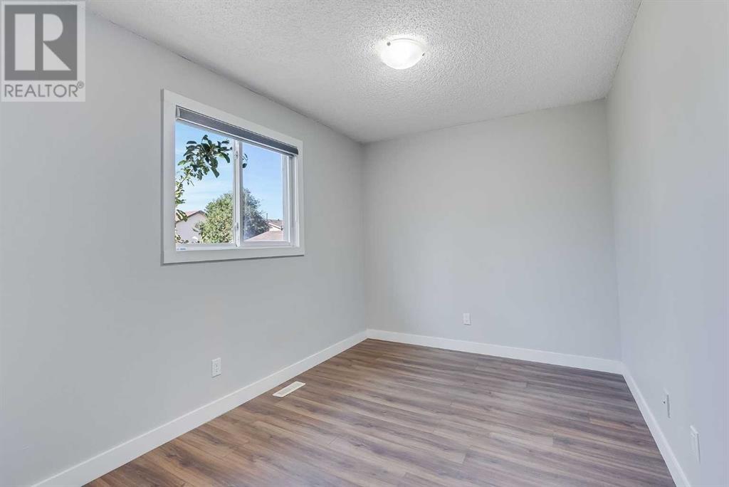 Single Family House Bi-level for Sale in  Castlebrook Rise NE Castleridge Calgary 