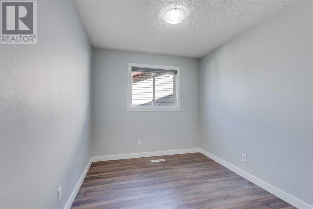 Single Family House Bi-level for Sale in  Castlebrook Rise NE Castleridge Calgary 