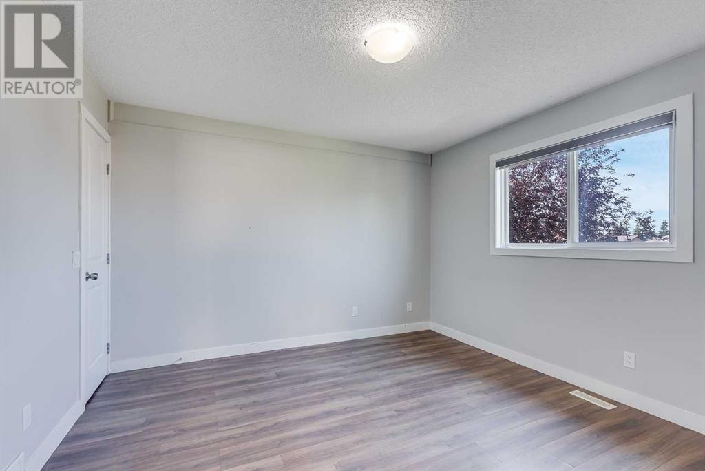 Single Family House Bi-level for Sale in  Castlebrook Rise NE Castleridge Calgary 