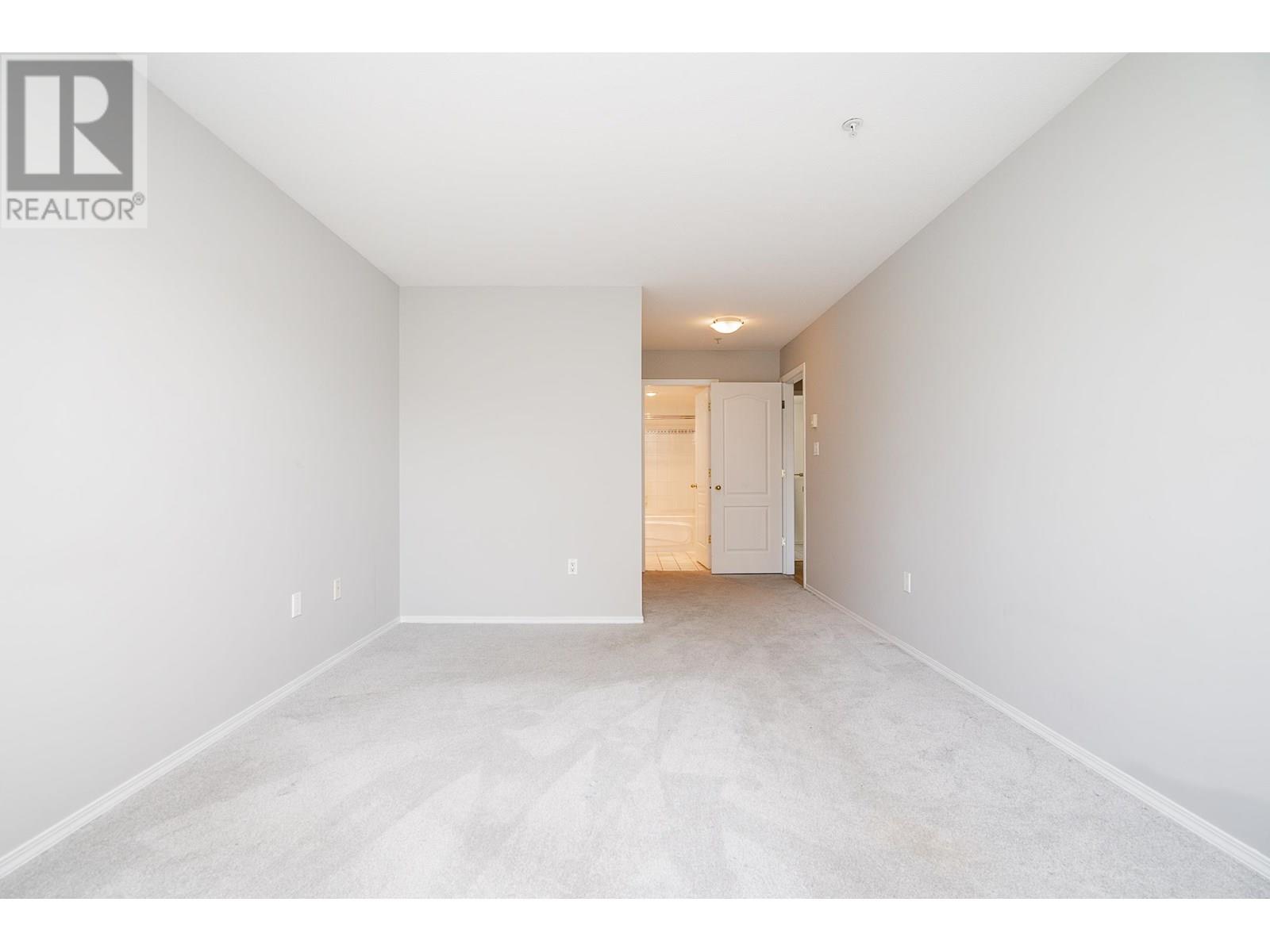 Photo 11 of 403 2559 Parkview Lane, Port Coquitlam BC