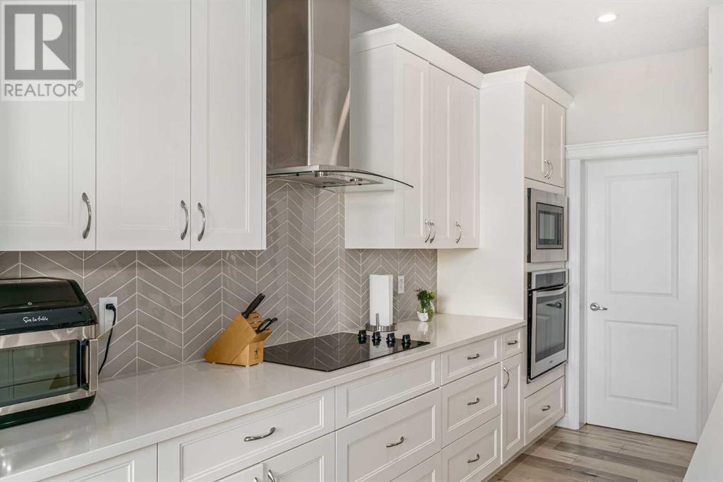 Single Family House for Sale in  Belmont Terrace SW Belmont Calgary 