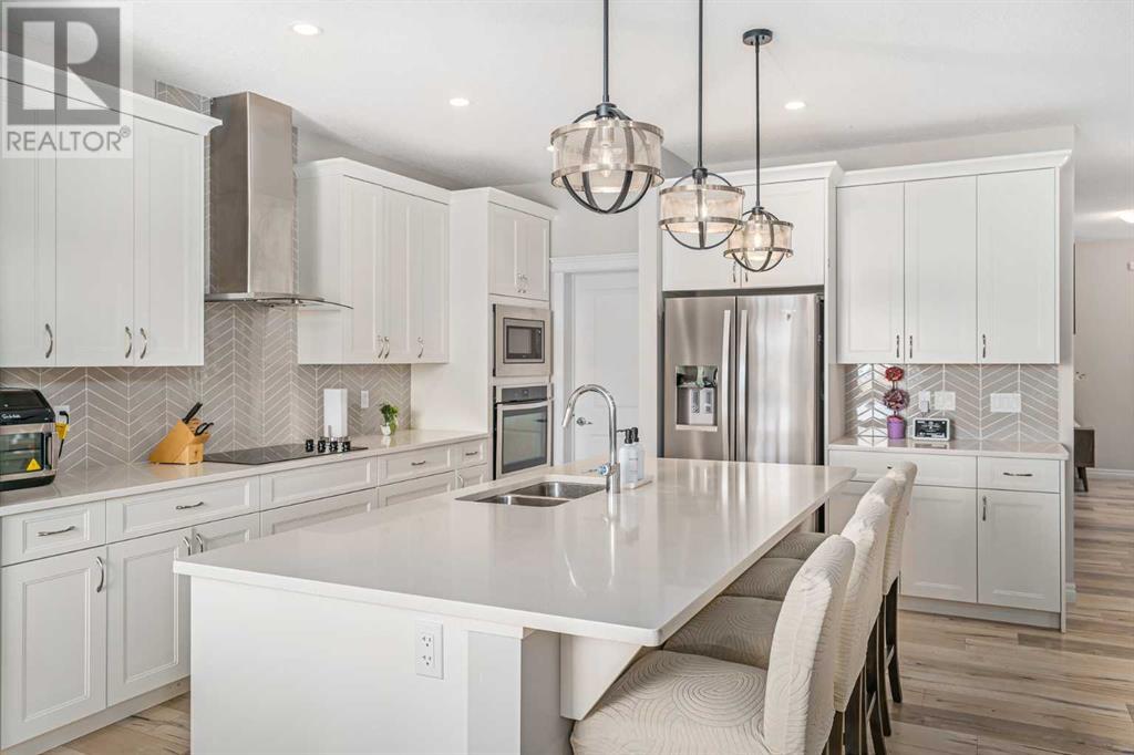 Single Family House for Sale in  Belmont Terrace SW Belmont Calgary 
