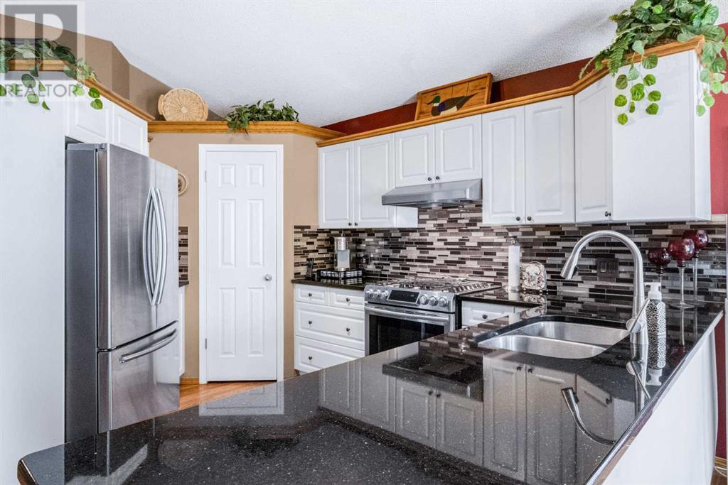 Single Family House Bungalow for Sale in  Mt Copper Green SE McKenzie Lake Calgary 
