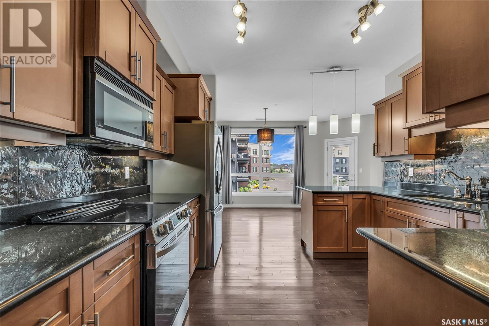 Photo 1 of 209 405 Cartwright Street, Saskatoon SK