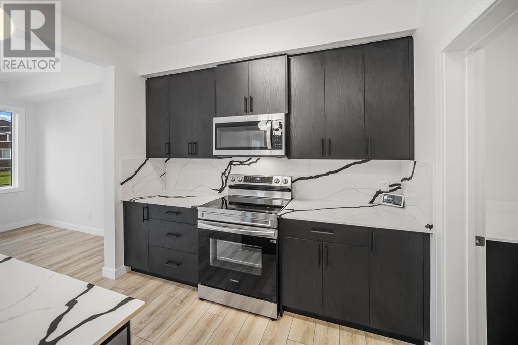 Single Family House for Sale in  Belmont Park SW Belmont Calgary 
