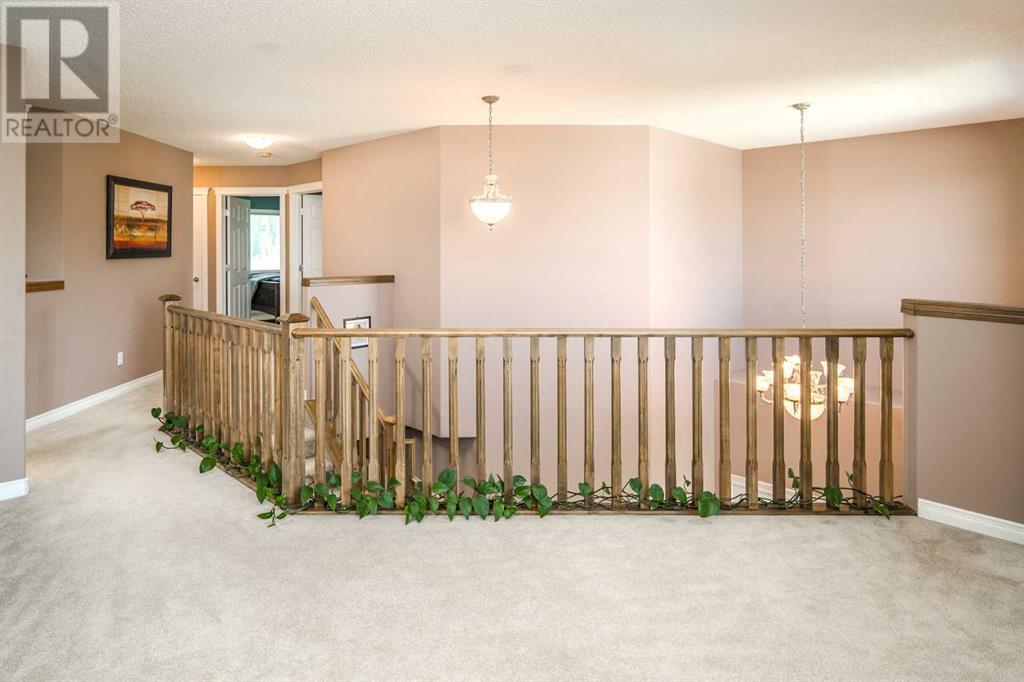 Single Family House for Sale in  Everhollow Way SW Evergreen Calgary 
