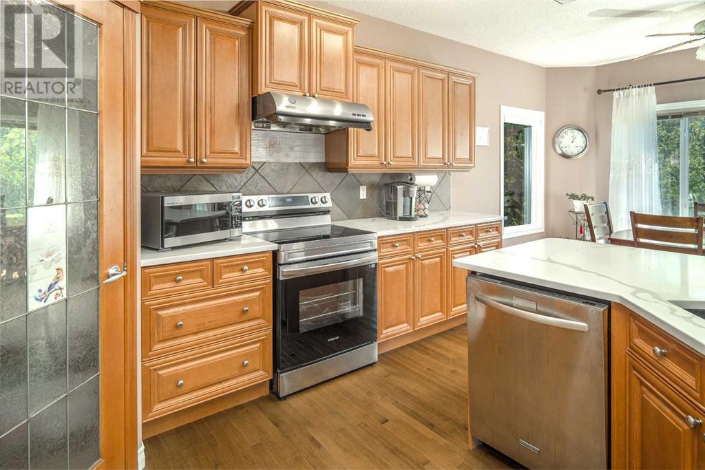 Single Family House for Sale in  Everhollow Way SW Evergreen Calgary 