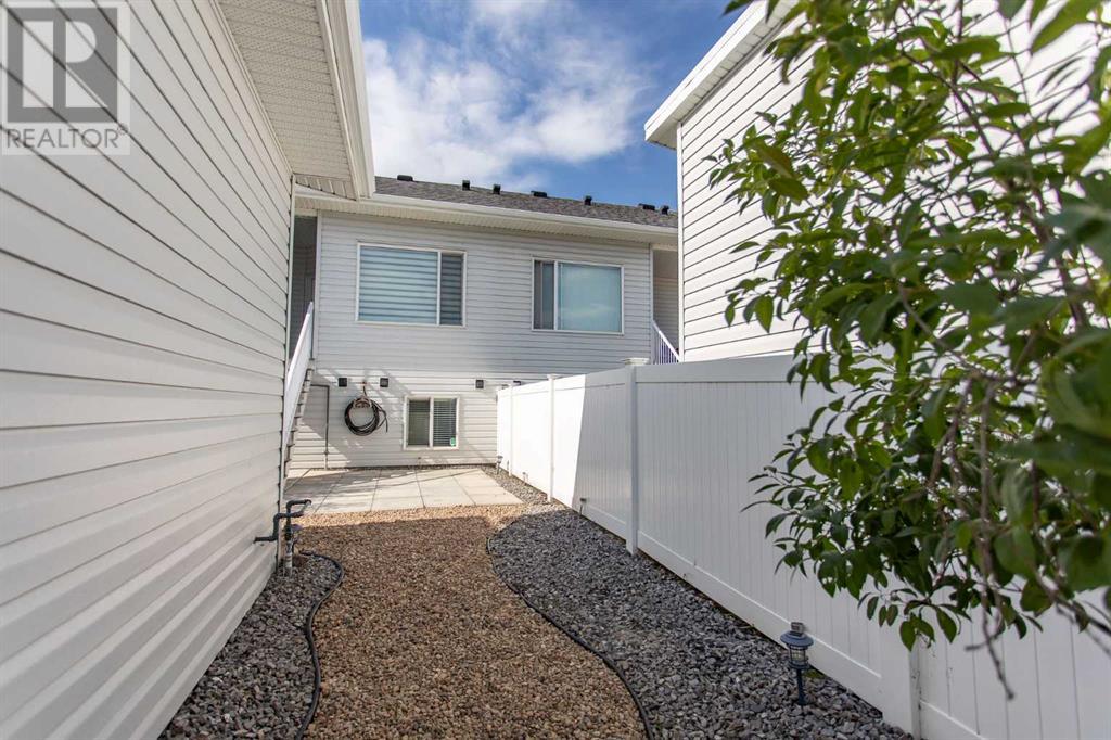 Single Family House Bi-level for Sale in  Ellington Crescent Evergreen Red Deer 