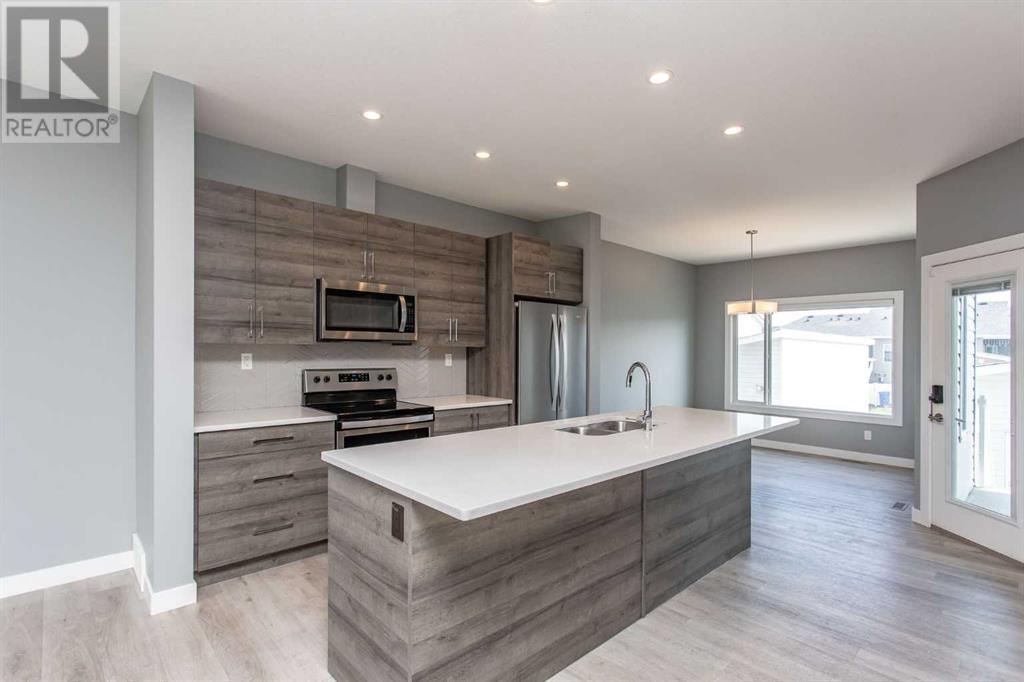 Single Family House Bi-level for Sale in  Ellington Crescent Evergreen Red Deer 