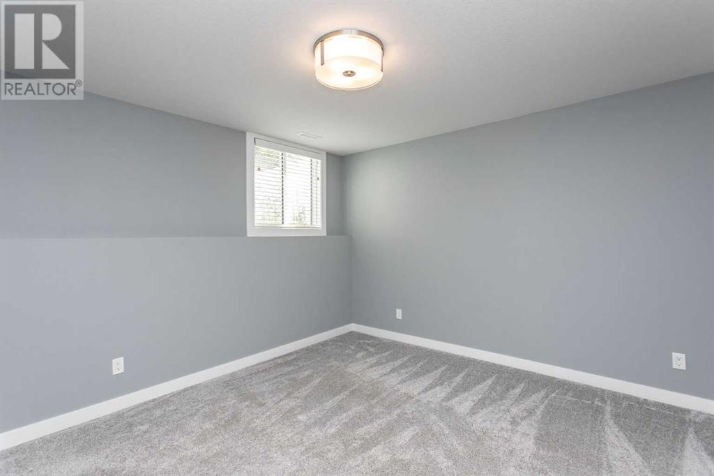 Single Family House Bi-level for Sale in  Ellington Crescent Evergreen Red Deer 