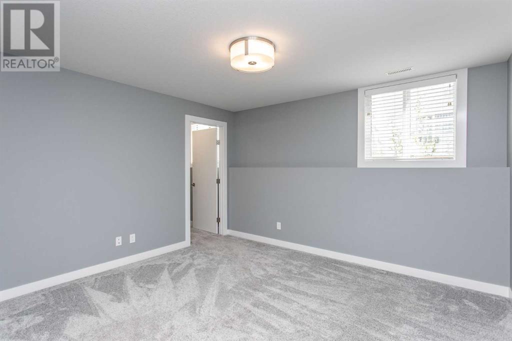 Single Family House Bi-level for Sale in  Ellington Crescent Evergreen Red Deer 