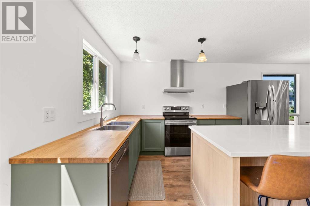 Single Family House 4 Level for Sale in  Bernard Court NW Beddington Heights Calgary 