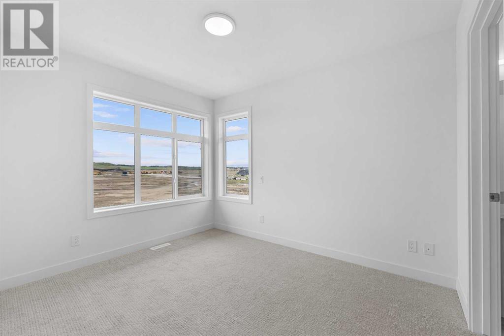 Single Family House for Sale in   Belmont Drive SW Belmont Calgary 