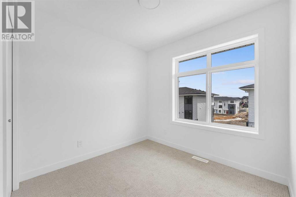 Single Family House for Sale in   Belmont Drive SW Belmont Calgary 