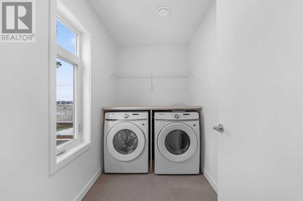 Single Family House for Sale in   Belmont Drive SW Belmont Calgary 