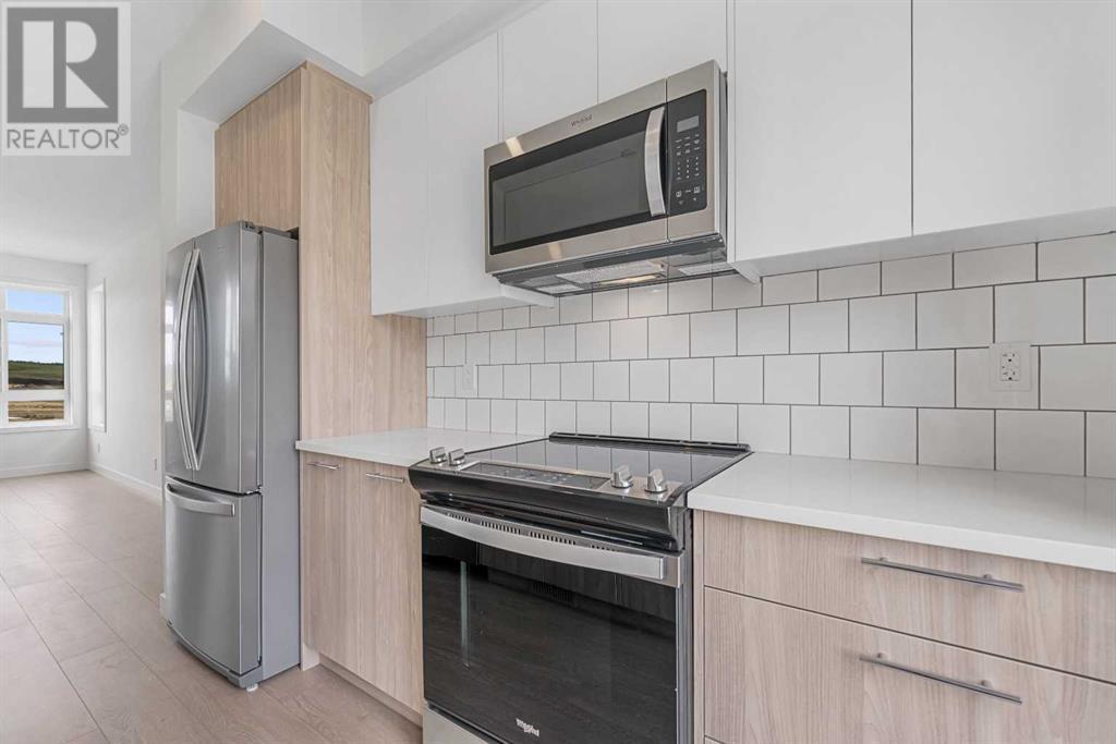 Single Family House for Sale in   Belmont Drive SW Belmont Calgary 