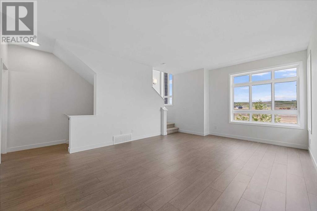 Single Family House for Sale in   Belmont Drive SW Belmont Calgary 