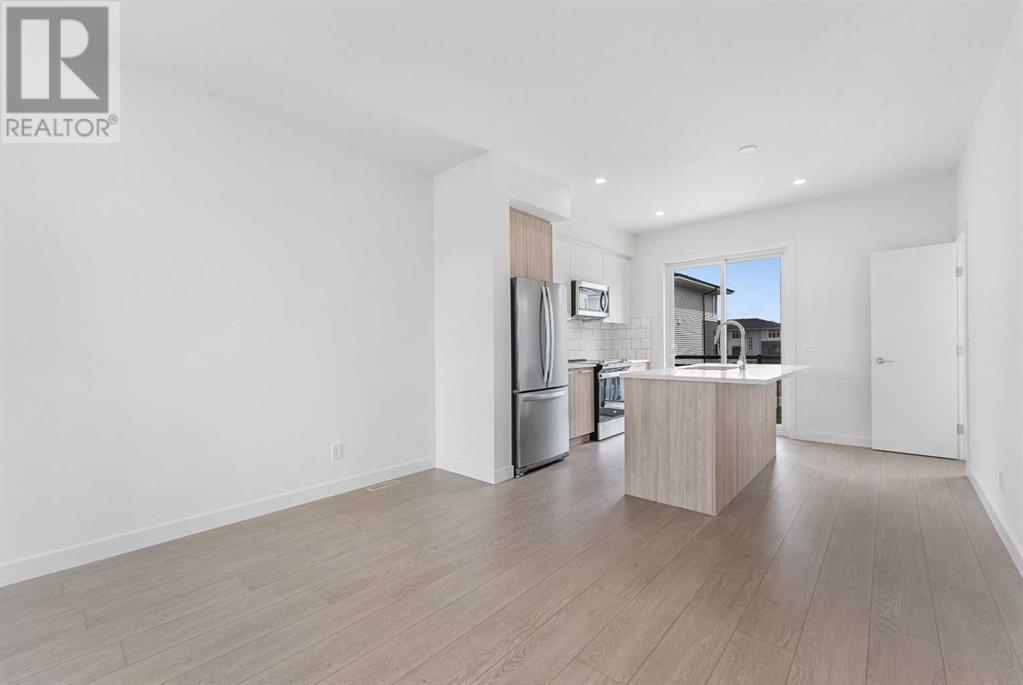 Single Family House for Sale in   Belmont Drive SW Belmont Calgary 