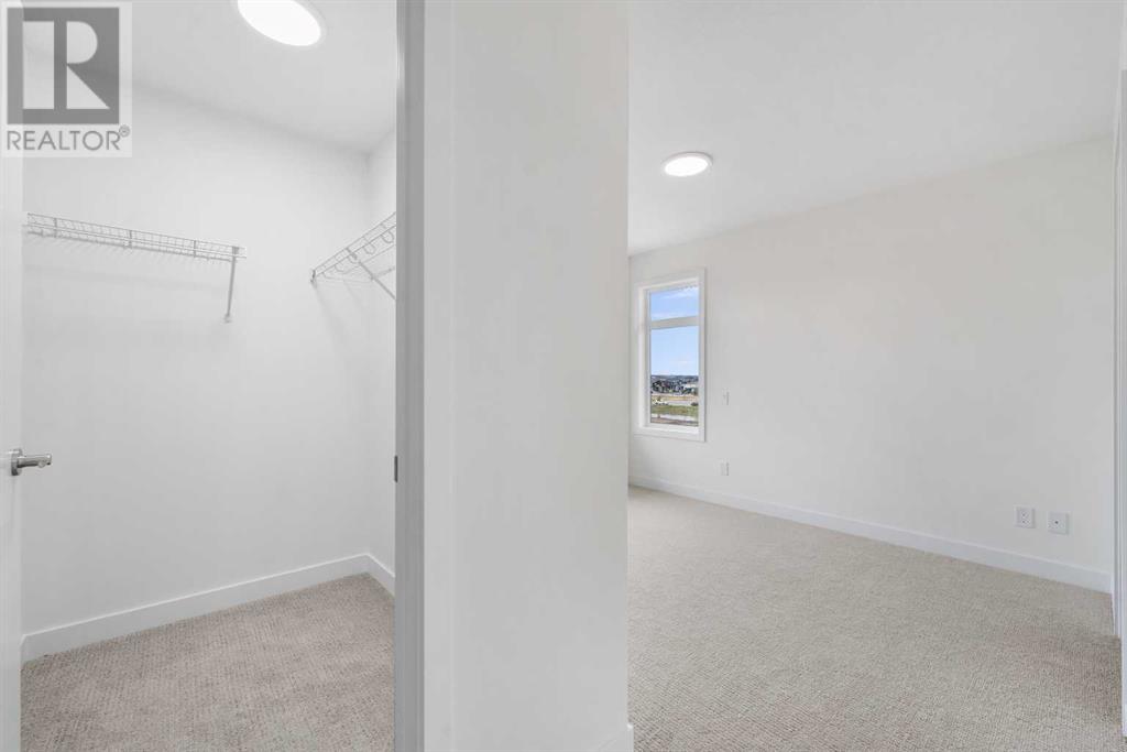 Single Family House for Sale in   Belmont Drive SW Belmont Calgary 