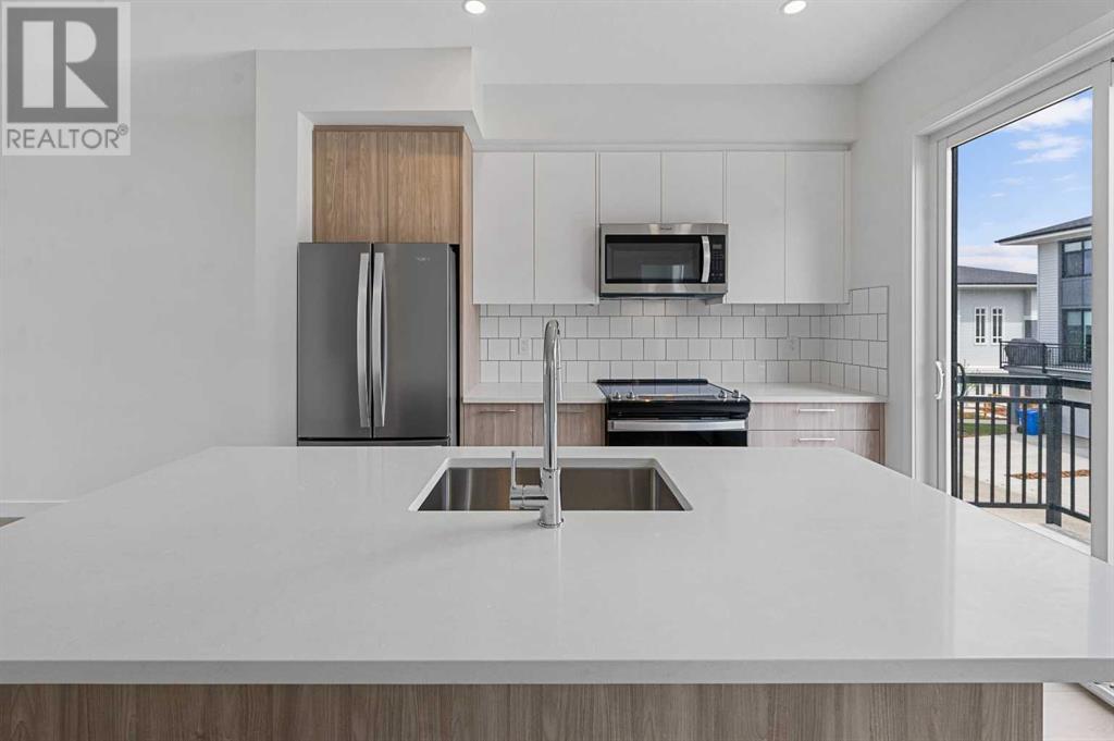 Single Family House for Sale in   Belmont Drive SW Belmont Calgary 
